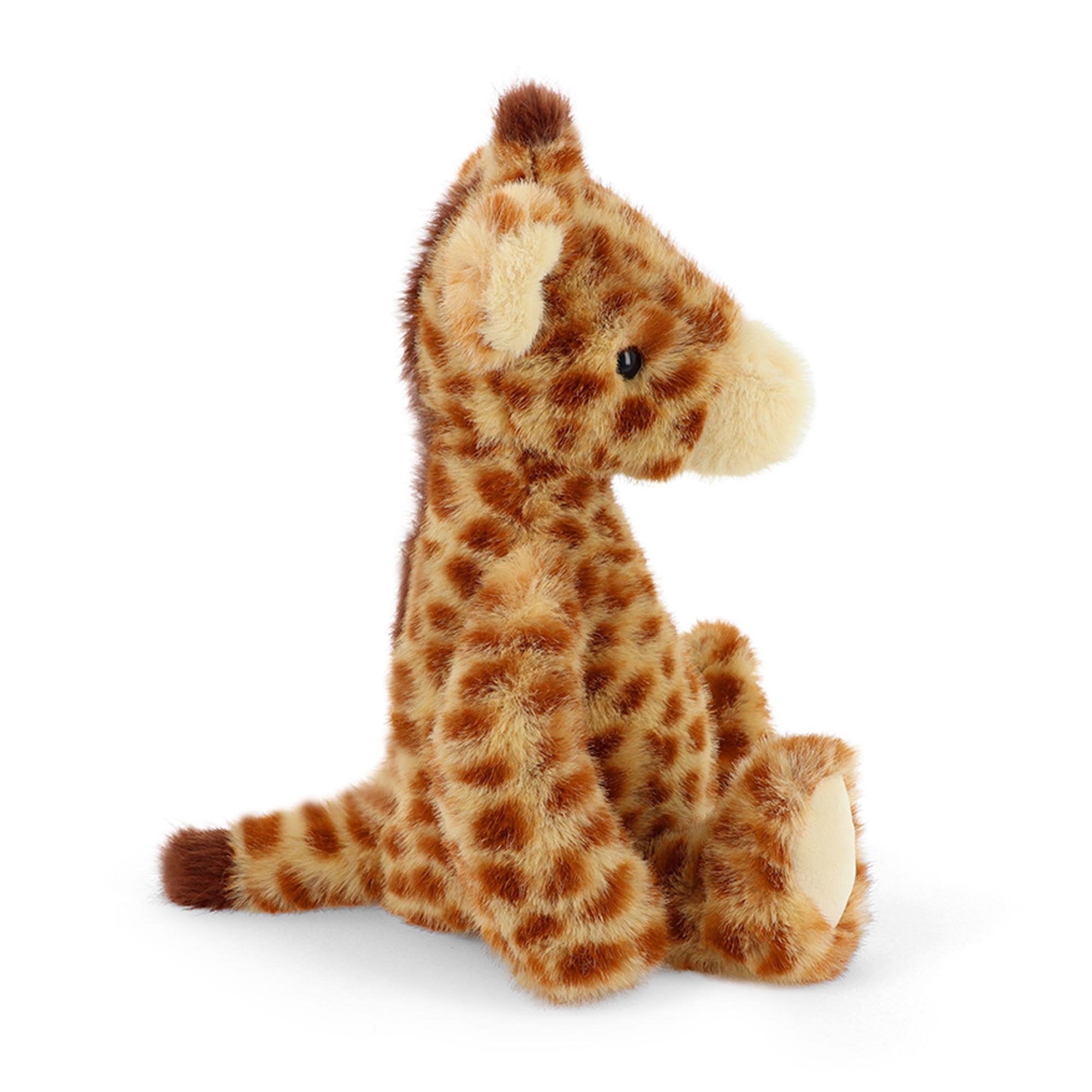 Plush giraffe sitting side on