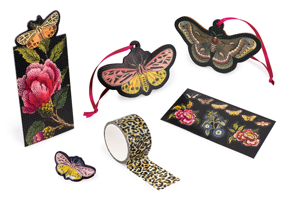 Moth Christmas decorations and pin badge, moth and floral bookmark and stickers and Jaguar print paper tape on white background