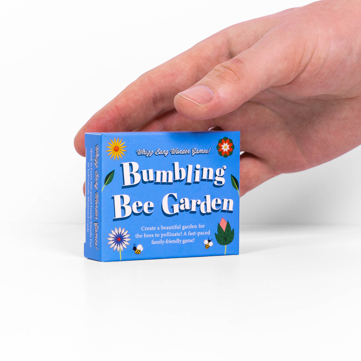 Bumbling Bee Garden Game box on side with hand holding it