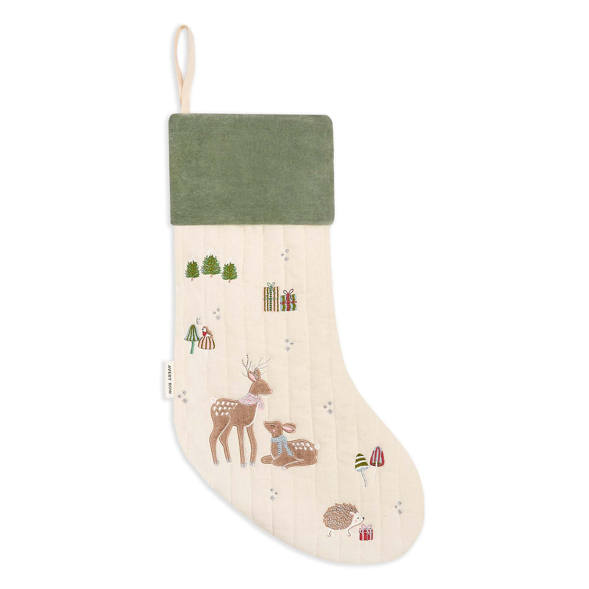 Flat lay of Reindeer embroidered cotton Christmas stocking with green velvet trim on white surface