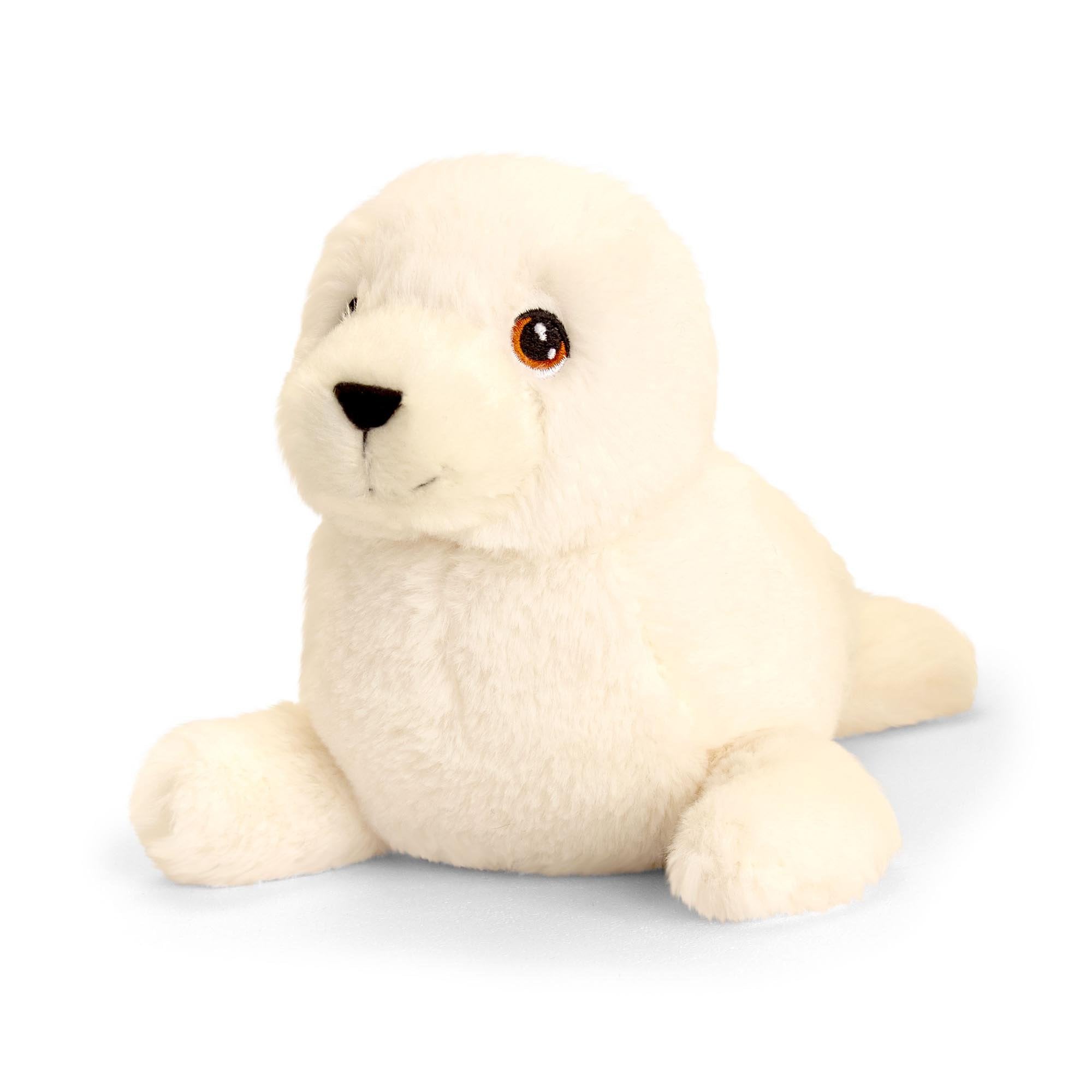 seal plush laying down on tummy