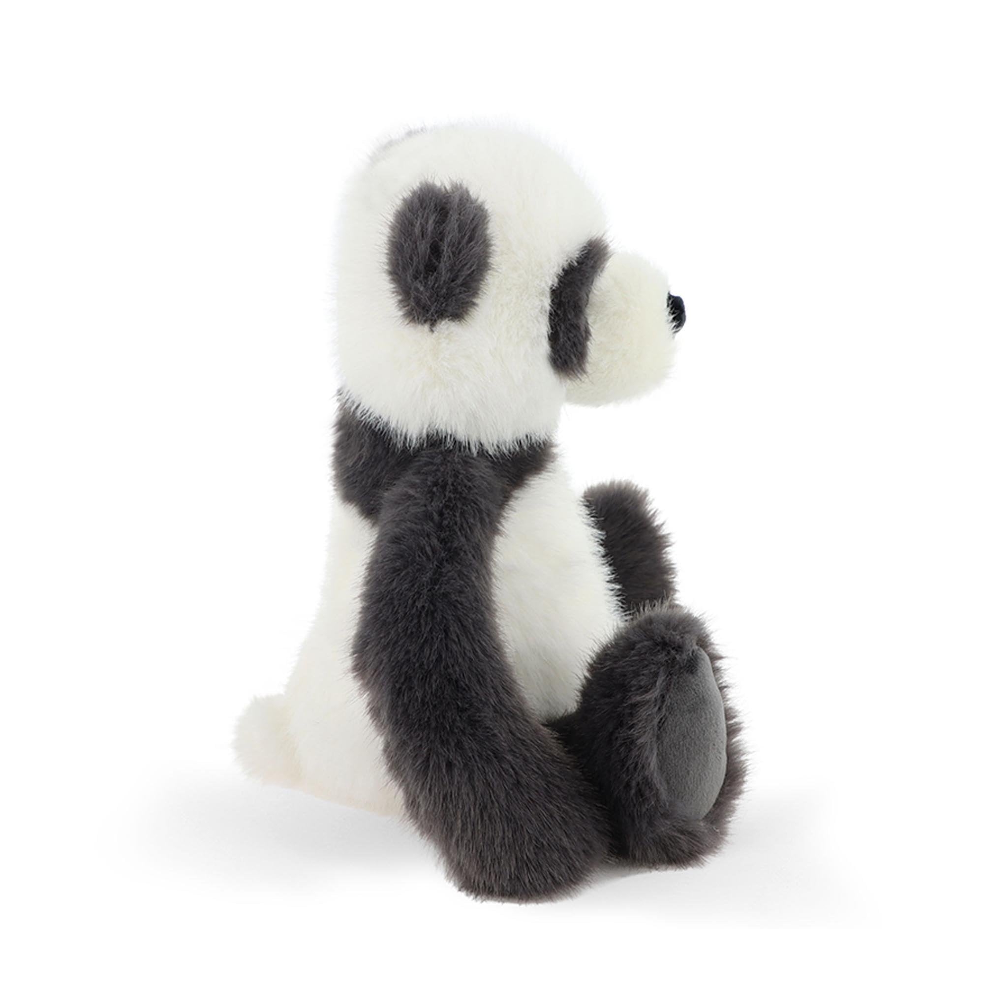 Panda plush toy sitting side on