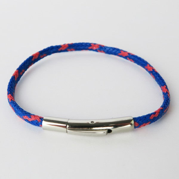 Close up of the recycled fishing net bracelet slightly from above to show the clasp in more detail