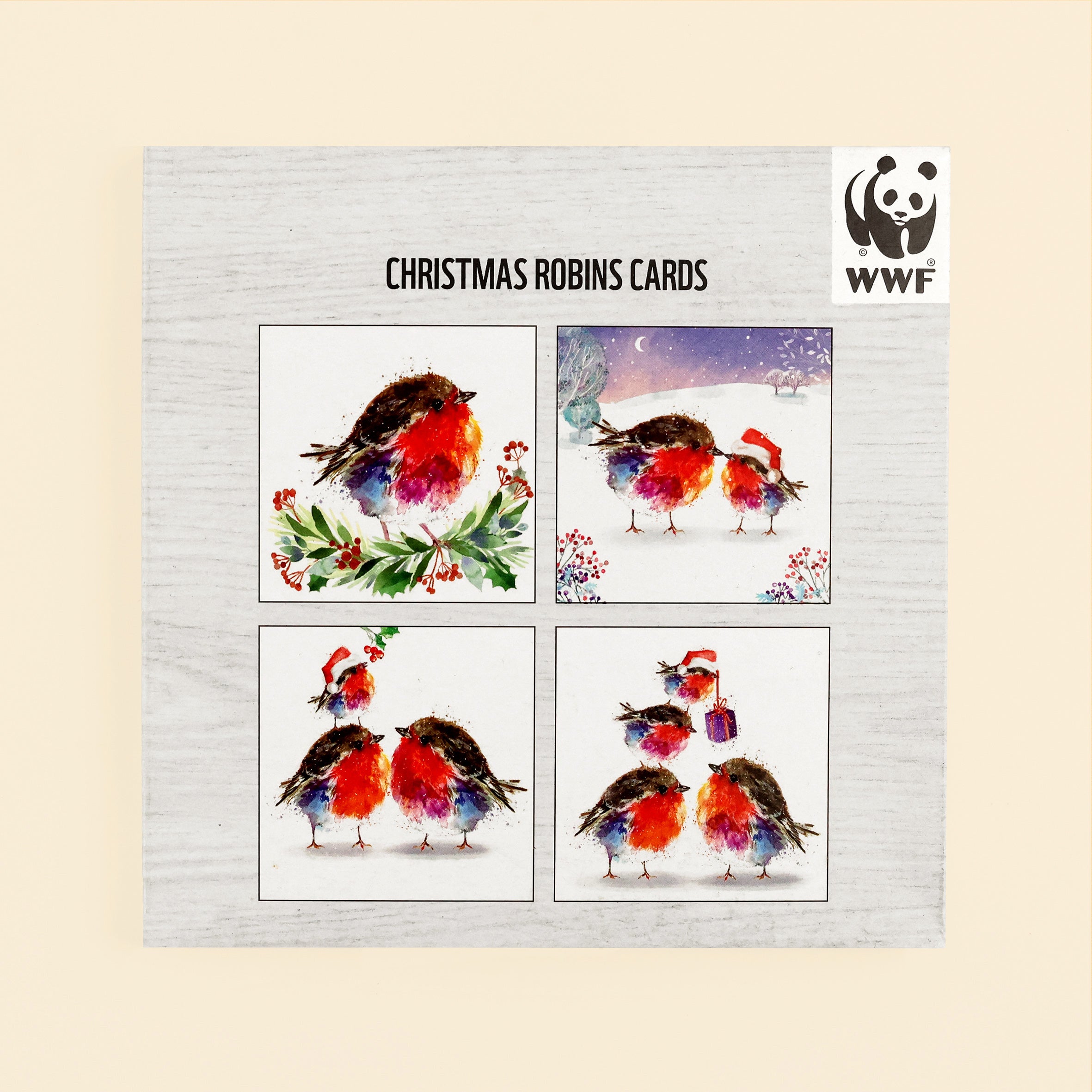 Front of pack of 8 Christmas Robins Cards showing the 4 designs and WWF logo on a cream background