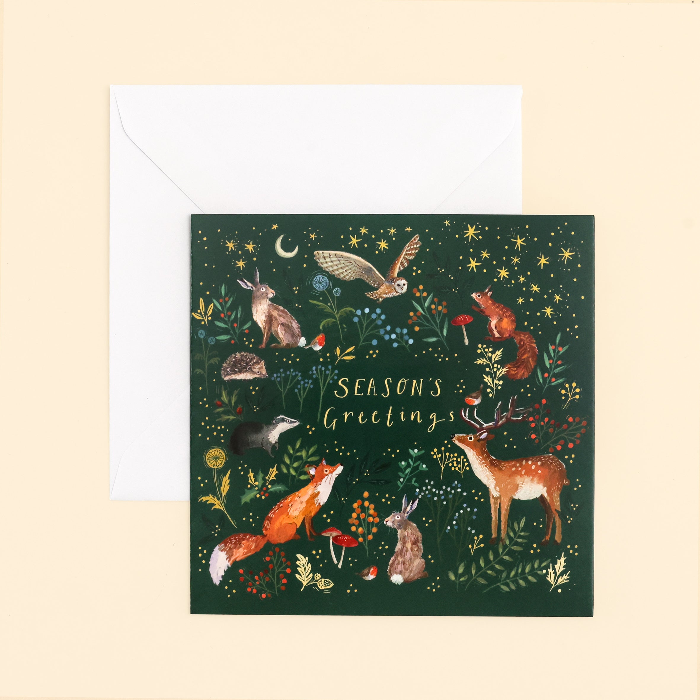 Single Woodland Season's Greetings Card with envelope on cream background