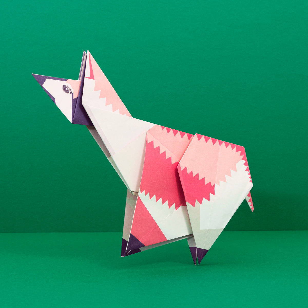 Origami Llama constructed on green background