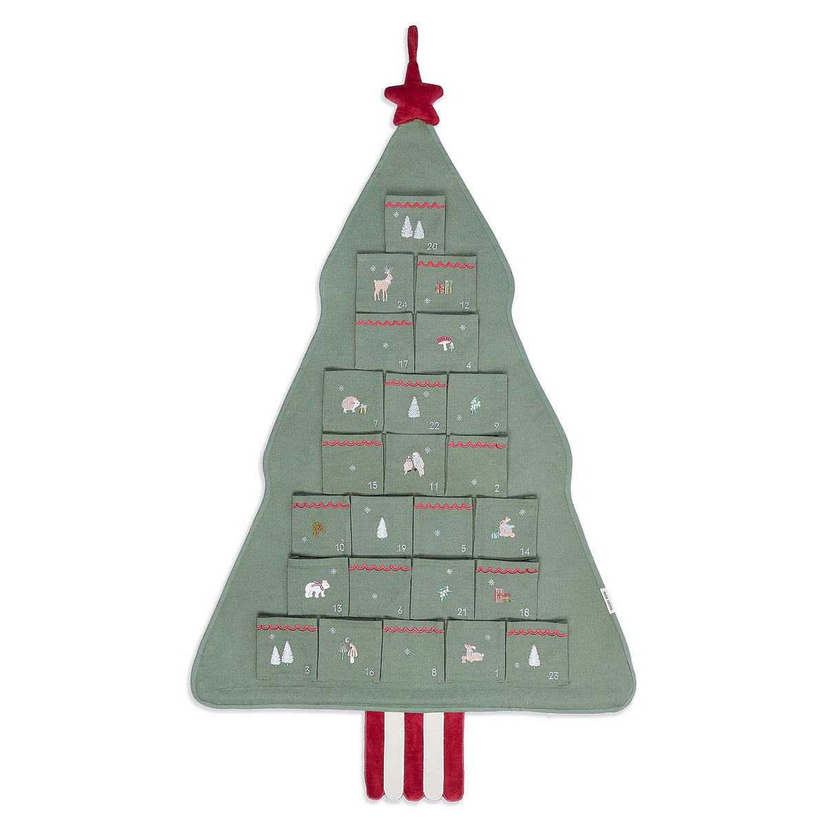 Flat lay of embroidered cotton tree advent calendar on white surface